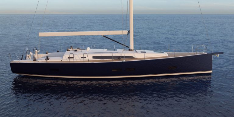 A sleek sailboat floating on calm ocean waters.