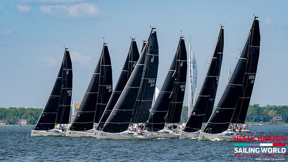 Sailboats racing on a sunny day.