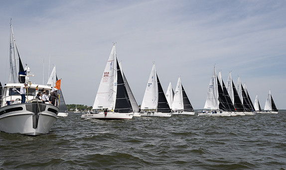 Sailboats racing on a windy day.