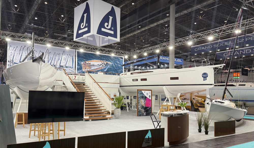 Boat show exhibition with sailboats on display.