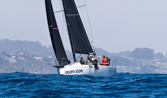 Sailboat racing on the ocean waters.