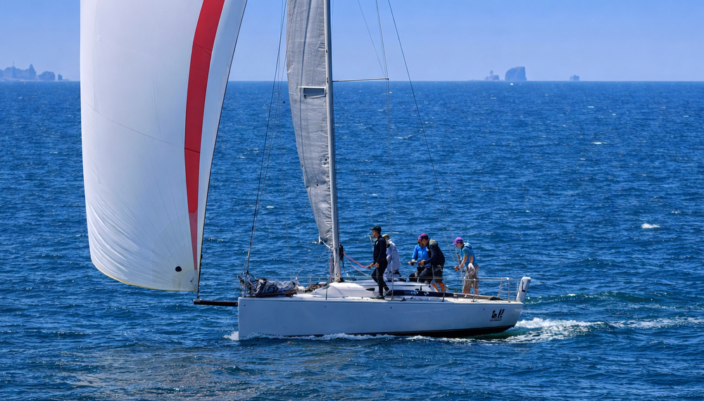 J/111 sailing offshore on the Pacific Ocean.